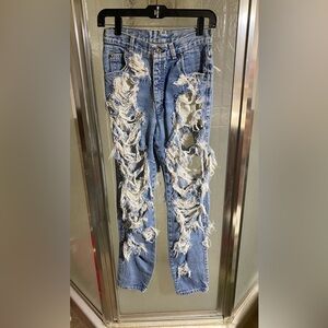 Vintage white label heavily distressed Levi jeans